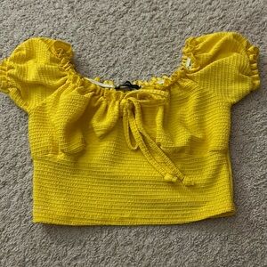 women’s yellow crop top